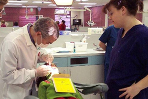 Dentist working on patient
