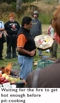 Waiting for the fire to get hot enough.