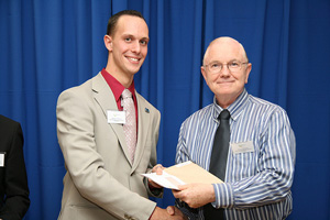 Adam Trevor and Tom Rippon, business instructor.