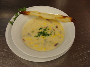 Corn, Bacon & Apple Chowder with Potato Tuile.
