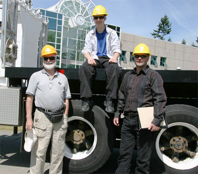 Retired Heavy Duty Instructor Ray Howard (l), BC Ferries Automotive Manager Chris Clements-Currier (r), Chris’ son & Heavy Duty Mechanic student (centre)