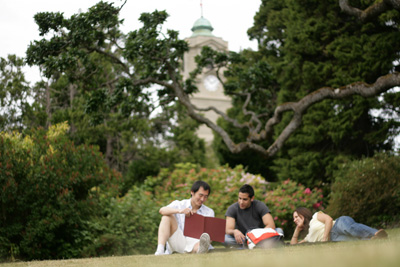Students on lawn in front of the Young building
