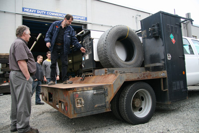 BC Ferries Automotive Manager Chris Clements-Currier demonstrating the mobile arc welder unit on board BC Ferries’ latest truck donation.