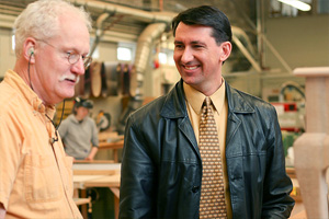 Eric Sehn talking to Cam Russel, Chair, Architectural Trades.