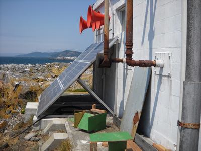 Building housing inverters and batteries for solar and tidal systems at Race Rocks