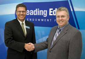 Advanced Education Minister Murray Coell and Dr. Tim Walzak