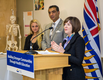 Camosun President Kathryn Laurin (r), Minister of Advanced Education Amrik Virk, and Camosun Mental Health and Addictions graduate Renate Chambers take part in health program funding announcement, Sept. 24.